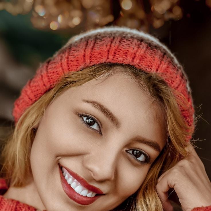 Aria Singh, Lead Design Curator at AnchorShiftWander, reviewing corporate floral arrangements